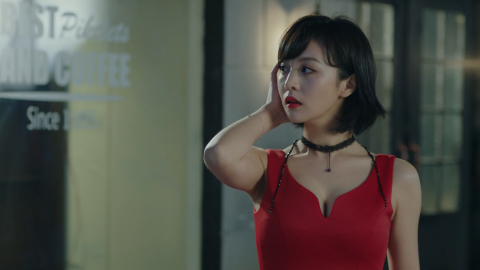 Zhu Hong's Red Dress Zhu Hong in a red dress, brushing back her hair